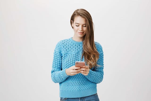 girl holding mobile