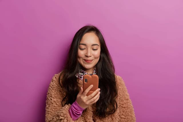 girl holding mobile